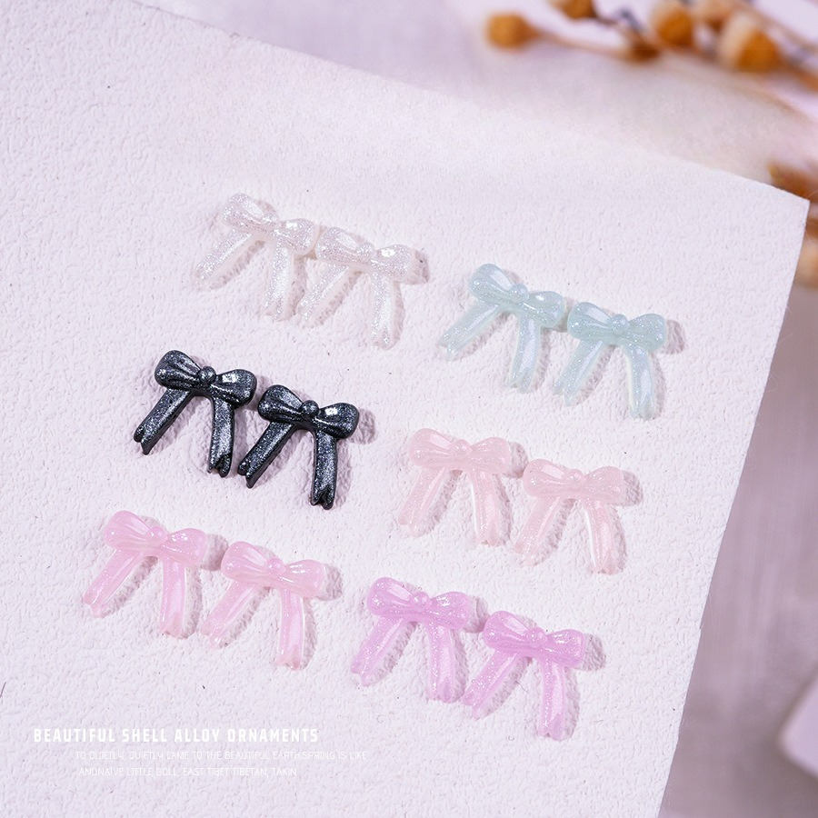 100個/パック 新しいグリッターボウタイ 暗闇で光るパッチ - Resin Glitter Pack のレビューと価格